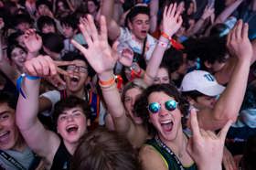 Group of people celebrating on stage