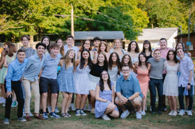 Group of people celebrating on stage