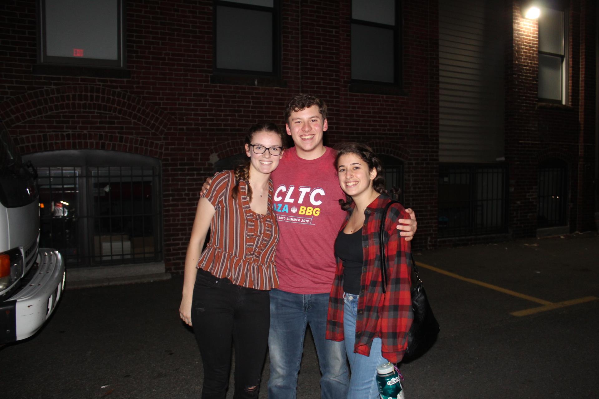 Group of people celebrating on stage