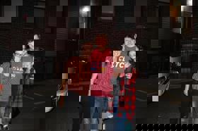 Group of people celebrating on stage