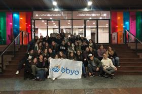 Group of people celebrating on stage