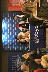 Group of people celebrating on stage