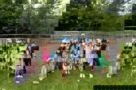 Group of people celebrating on stage