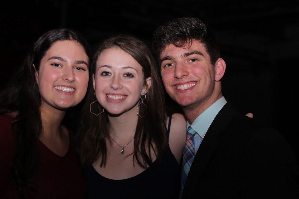 Group of people celebrating on stage