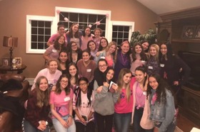 Group of people celebrating on stage