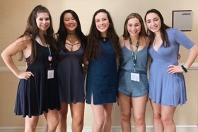 Group of people celebrating on stage