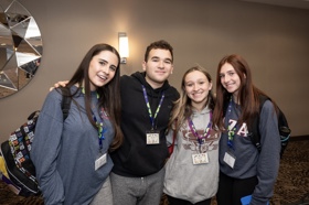 Group of people celebrating on stage