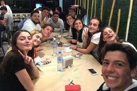 Group of people celebrating on stage