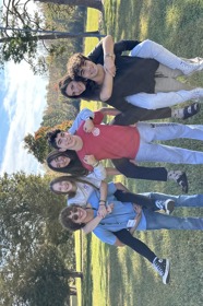 Group of people celebrating on stage