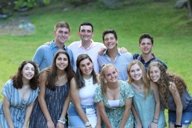 Group of people celebrating on stage