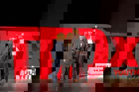 Group of people celebrating on stage