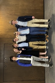 Group of people celebrating on stage