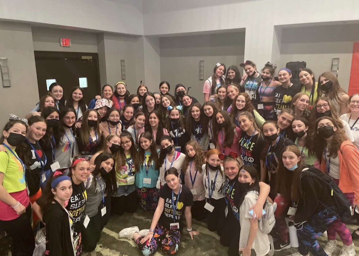 Group of people celebrating on stage