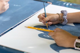 Group of people celebrating on stage