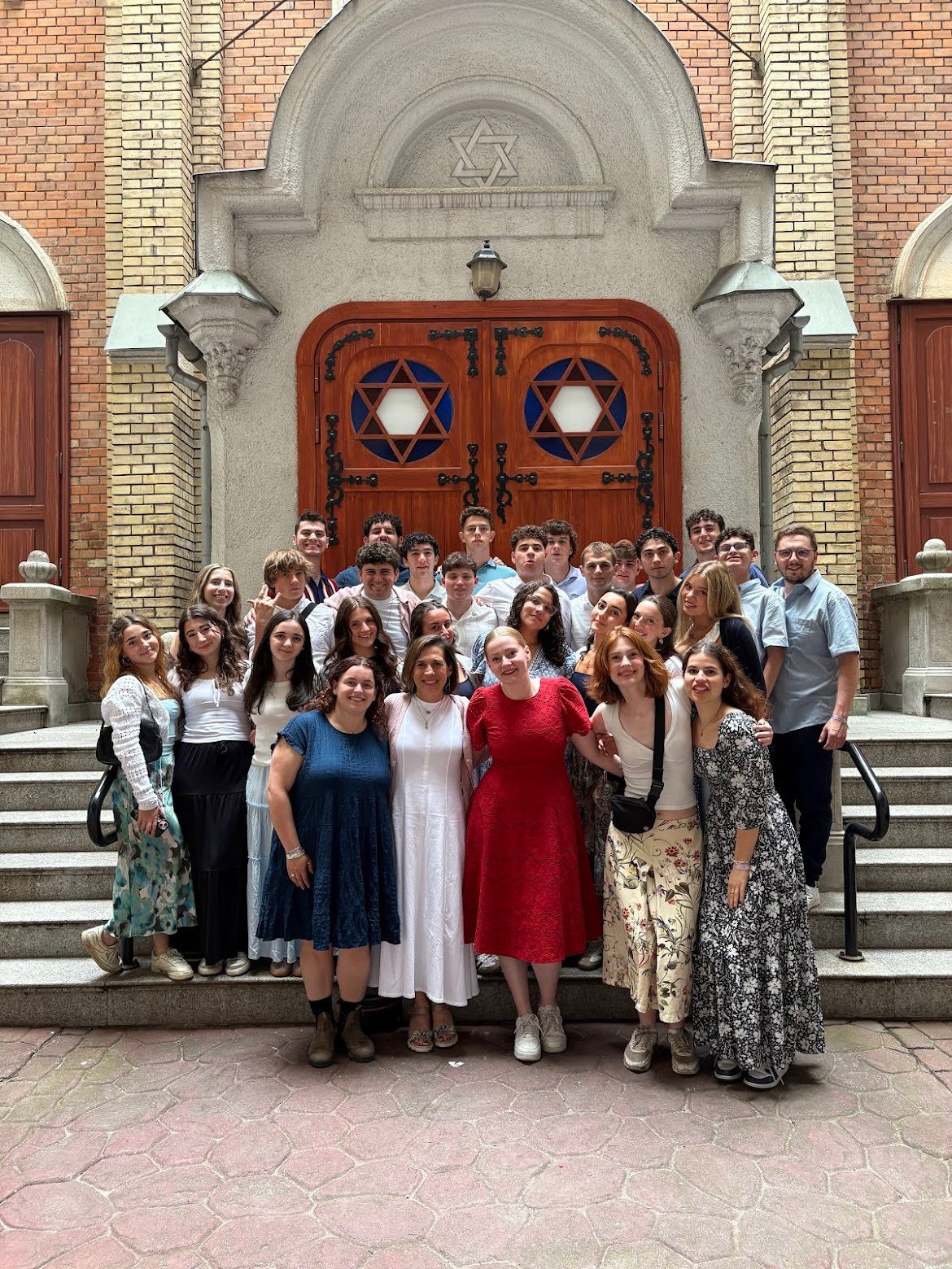 Group of people celebrating on stage