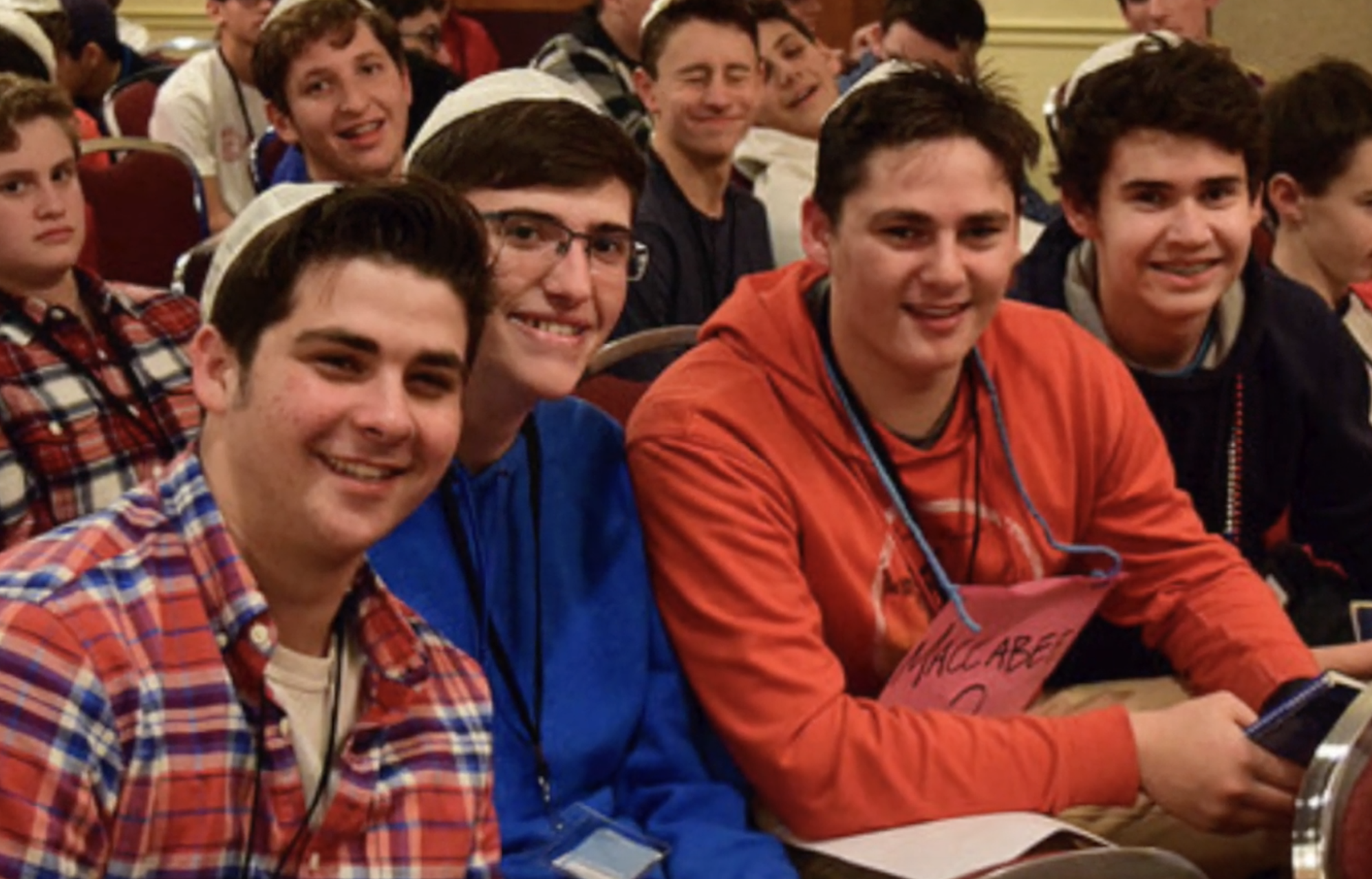 Group of people celebrating on stage