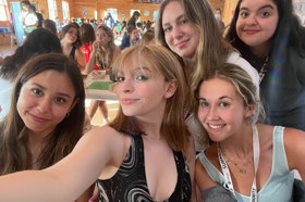 Group of people celebrating on stage