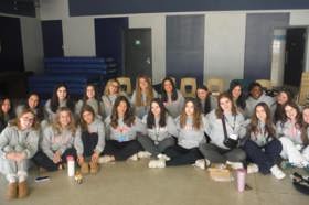 Group of people celebrating on stage