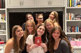 Group of people celebrating on stage