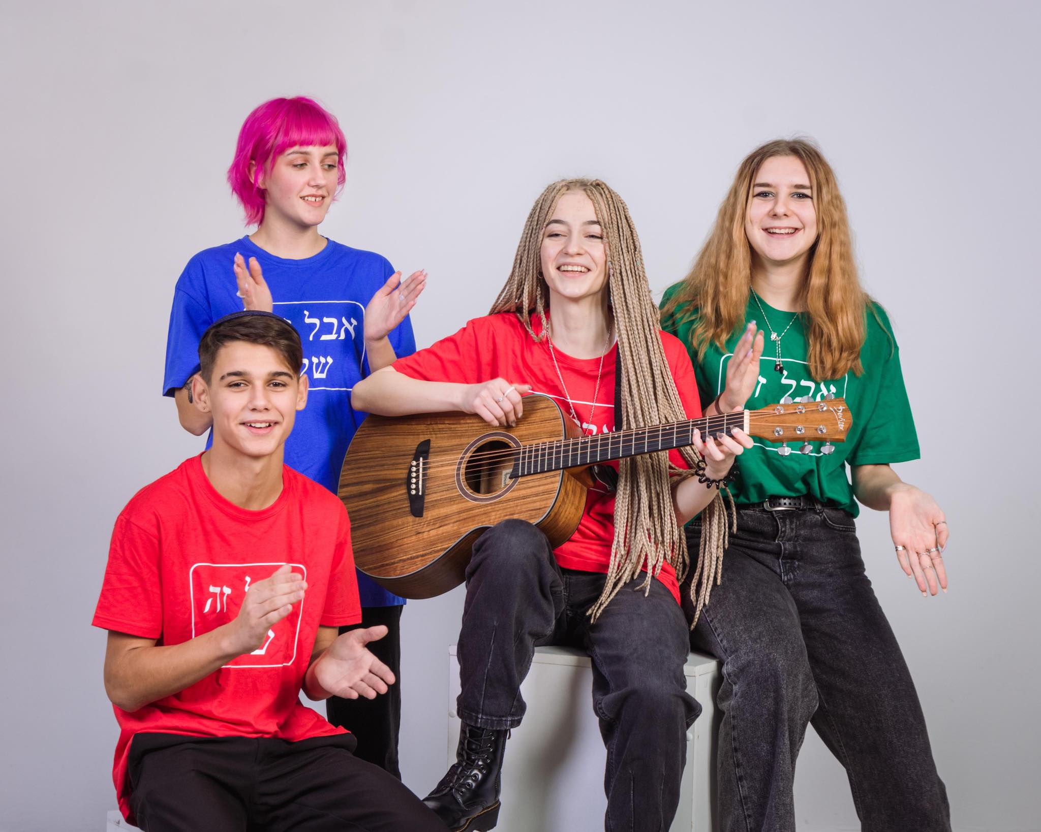 Group of people celebrating on stage