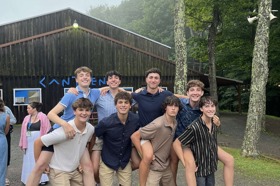 Group of people celebrating on stage