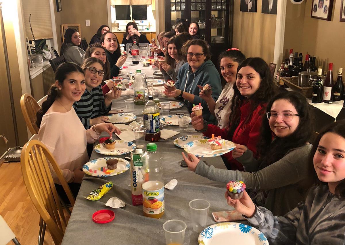 Group of people celebrating on stage