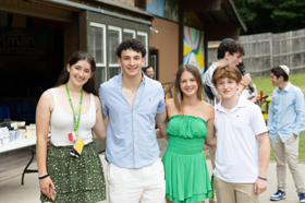 Group of people celebrating on stage