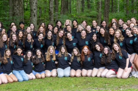 Group of people celebrating on stage