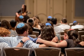 Group of people celebrating on stage