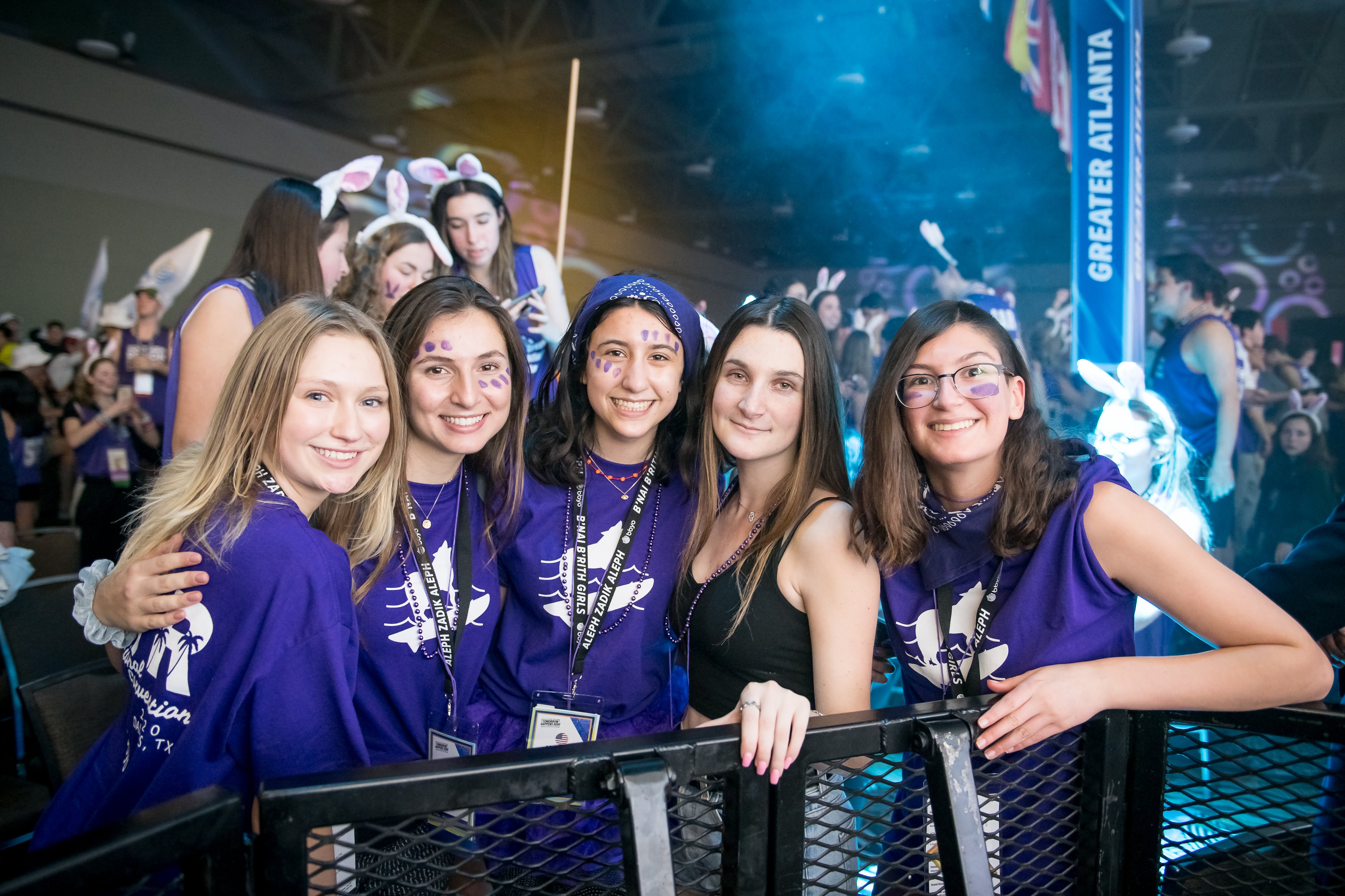 Group of people celebrating on stage