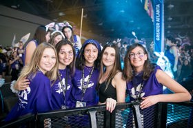 Group of people celebrating on stage