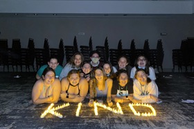 Group of people celebrating on stage