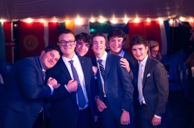 Group of people celebrating on stage