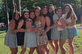 Group of people celebrating on stage