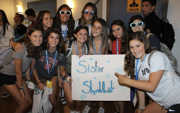 Group of people celebrating on stage