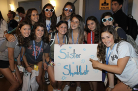 Group of people celebrating on stage