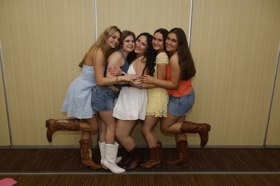 Group of people celebrating on stage