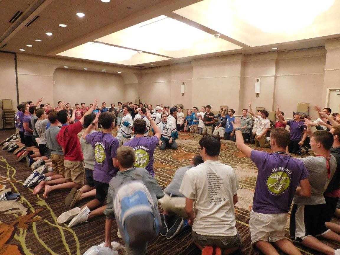 Group of people celebrating on stage