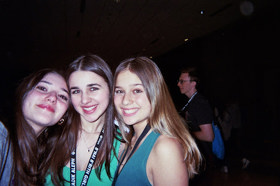 Group of people celebrating on stage