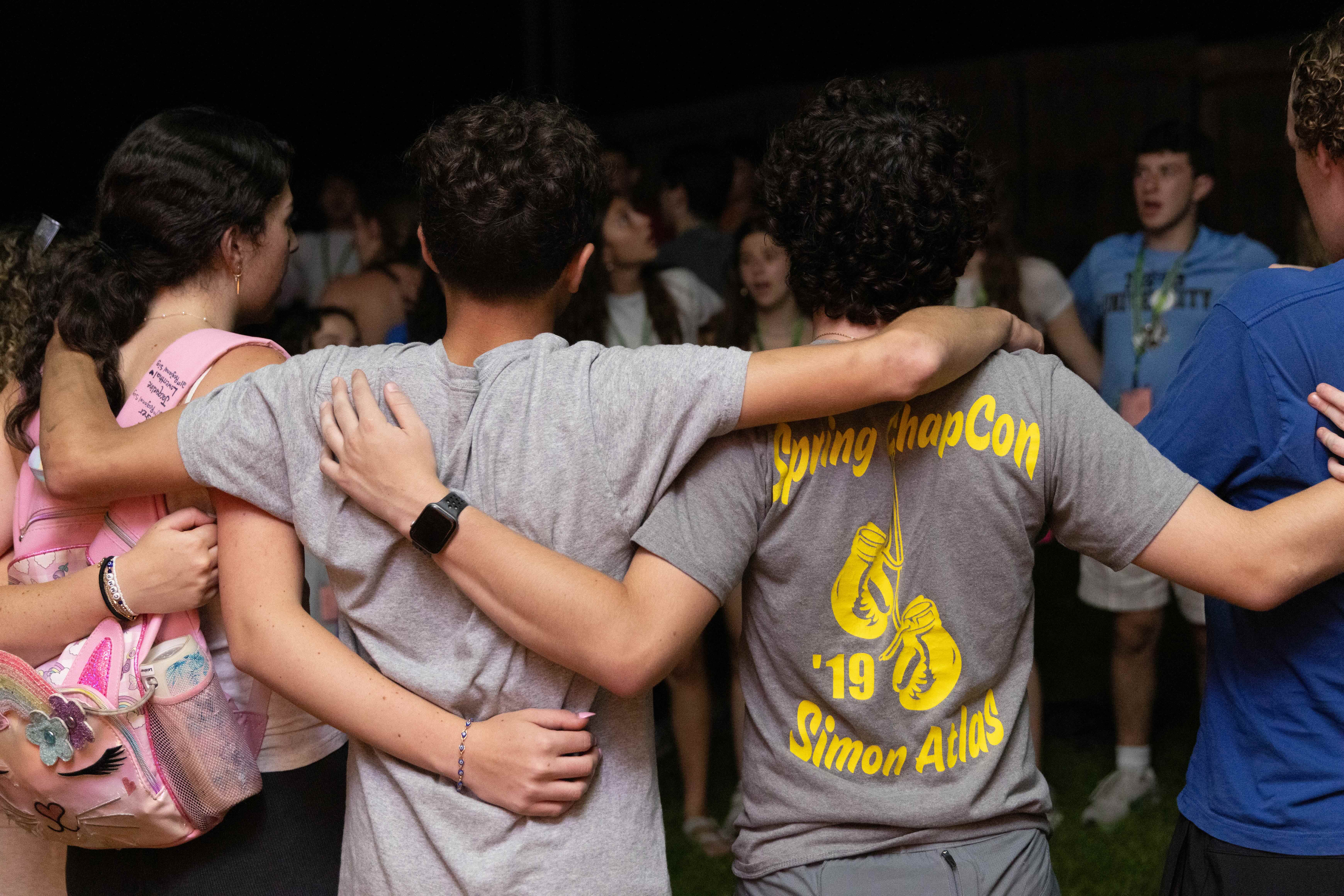 Group of people celebrating on stage