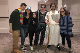 Group of people celebrating on stage