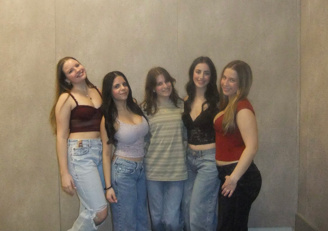 Group of people celebrating on stage