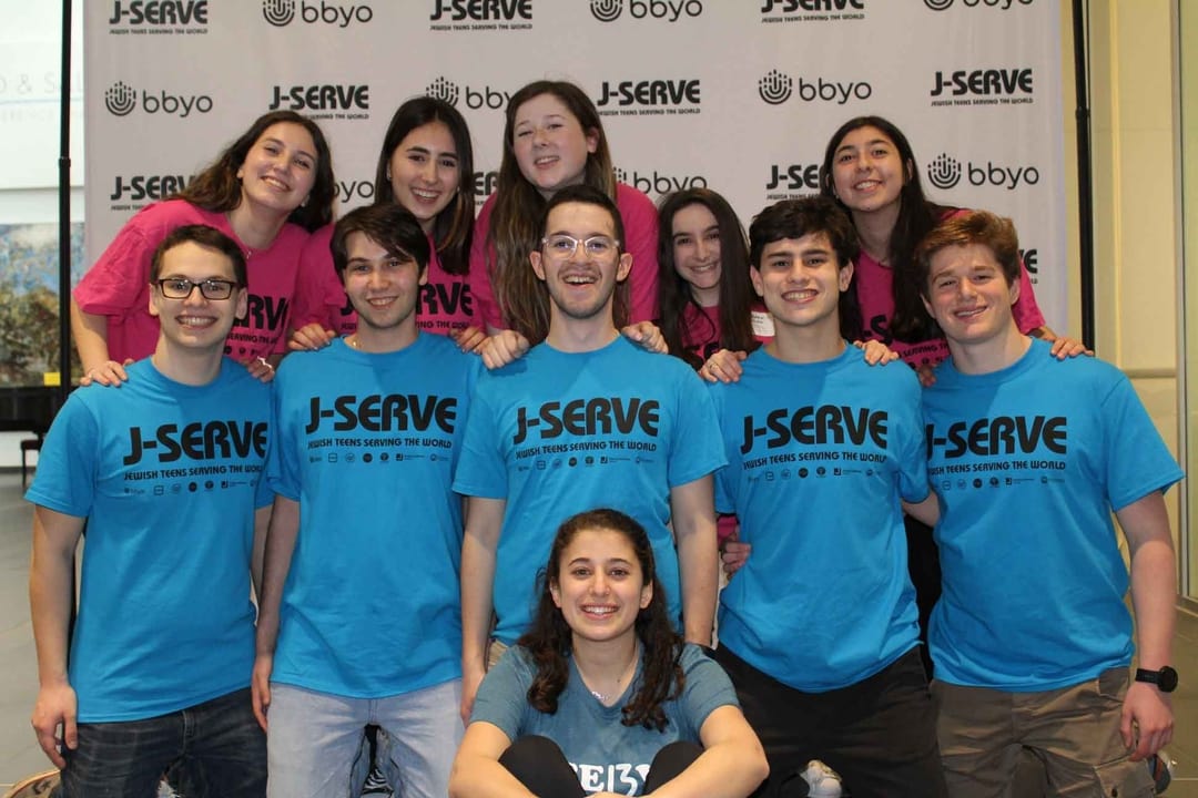 Group of people celebrating on stage