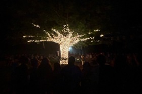 Group of people celebrating on stage