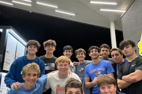 Group of people celebrating on stage