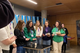 Group of people celebrating on stage