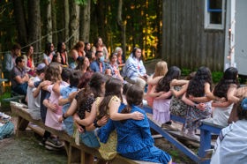 Group of people celebrating on stage
