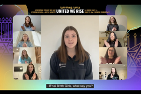 Group of people celebrating on stage