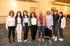 Group of people celebrating on stage