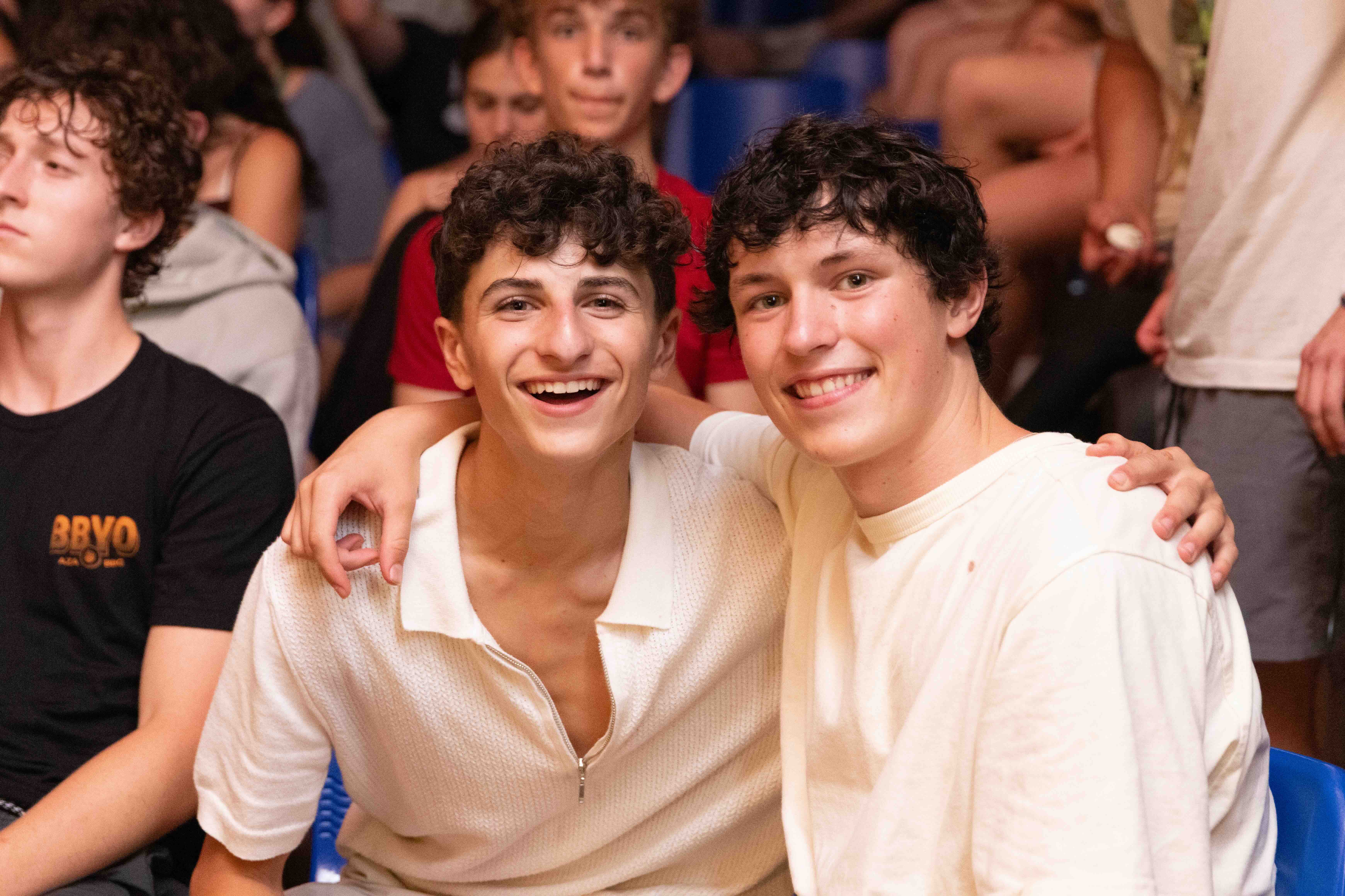 Group of people celebrating on stage